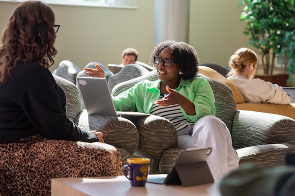 a group of people sitting on couches